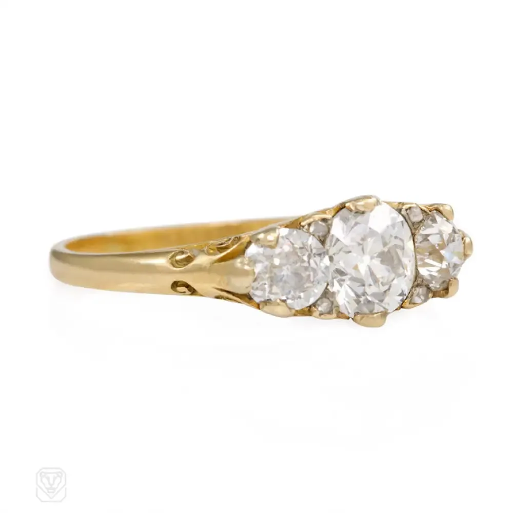 Antique half hoop three-stone diamond ring