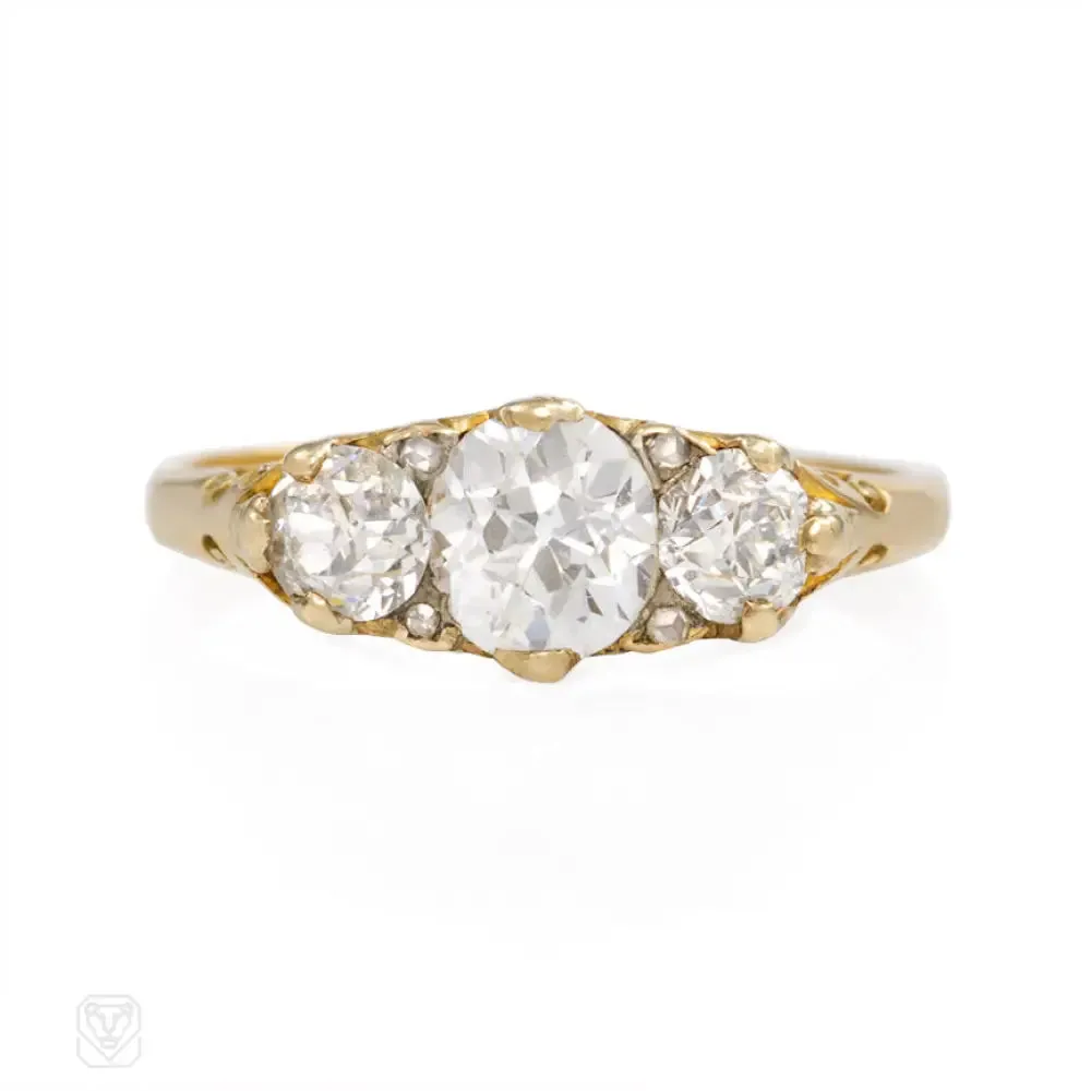 Antique half hoop three-stone diamond ring